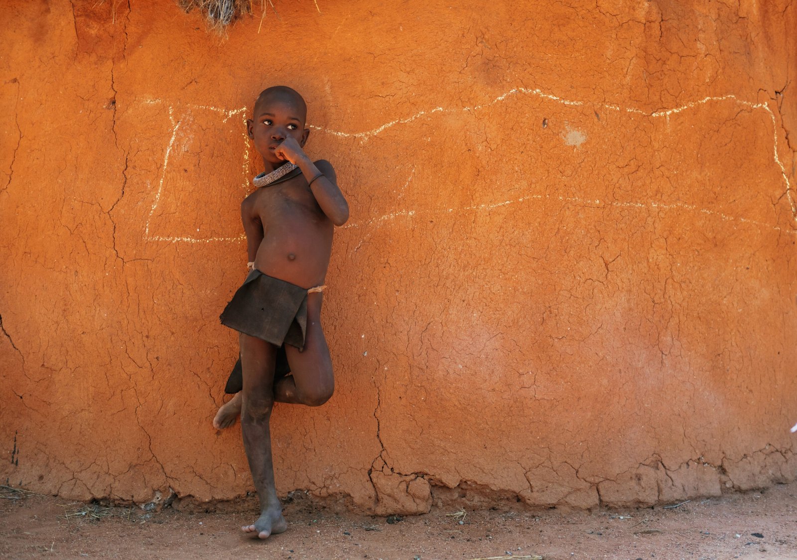 Namibia, Africa - June 14, 2021: Child of the ethnic people of Africa is outdoors.